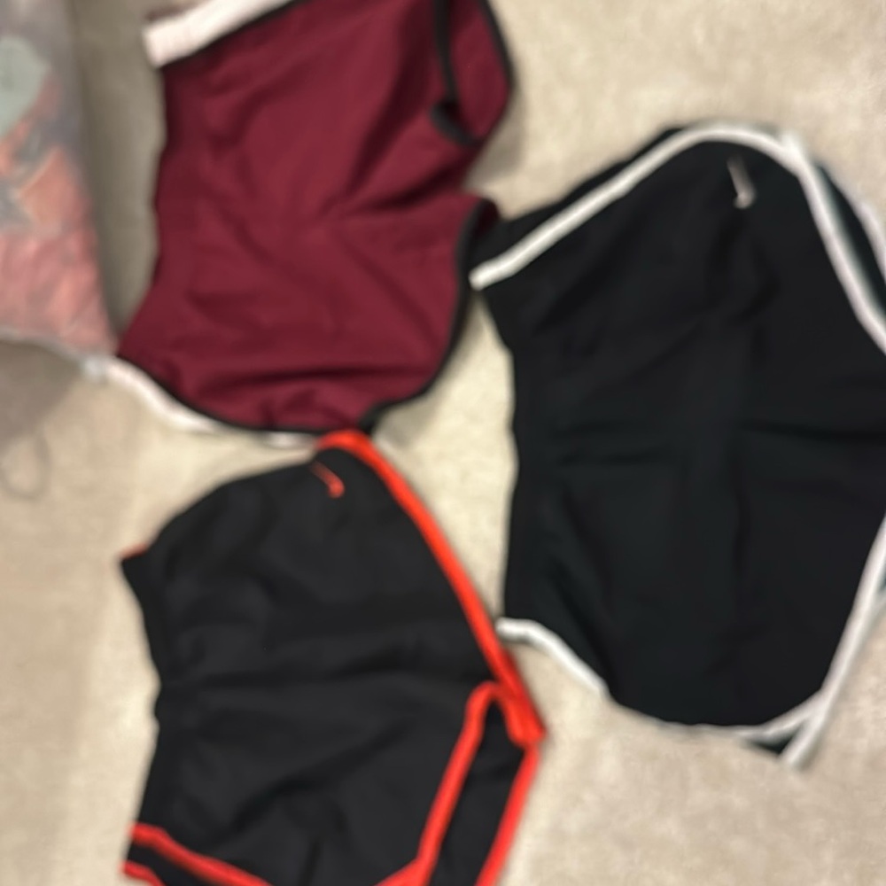 2 pair Nike shorts one pair is Augusta sportswear